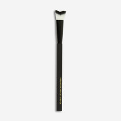 Curved brush for cleaning eyelash extensions