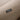 Detalle del tapizado beige de la camilla MAXI COZY HT